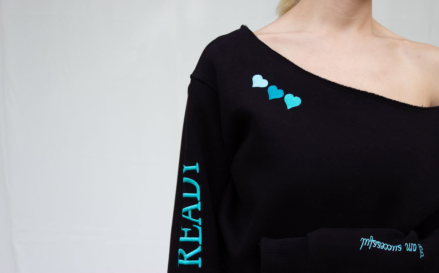 The "BORN READY" Off-the-shoulder Pullover